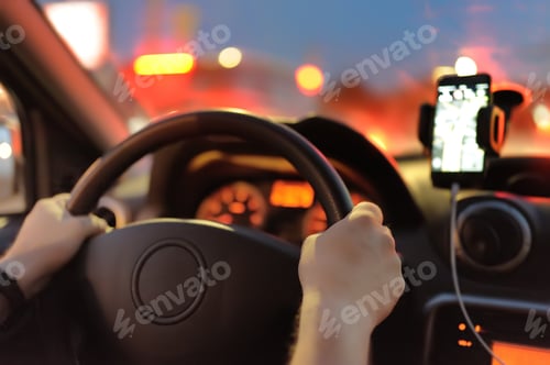 Preview: Male driver ride a car during evening traffic jam. Drive in the night city.