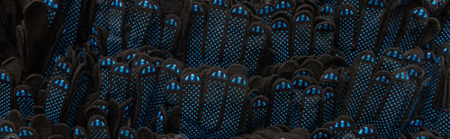 Preview: background of identical, black and blue rubberized work gloves, top view, banner