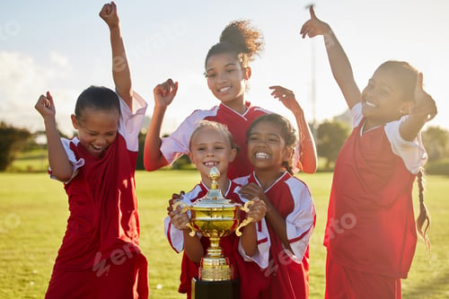 Preview: Children, football trophy and winning team of sports competition on soccer field for celebration of