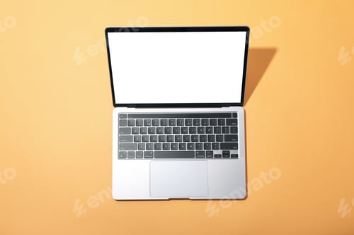 Preview: Laptop with blank screen on beige background