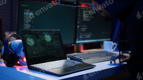 Preview: Cybercriminal opening notebook to exploit network backdoors, close up