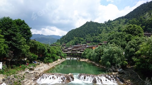 Preview: Miao village and shelter bridge by mountain