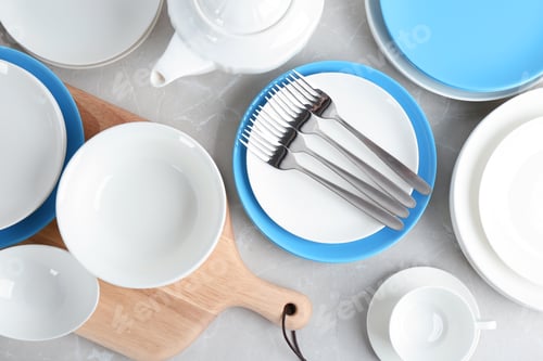 Preview: Flat lay composition with ceramic dishware on table
