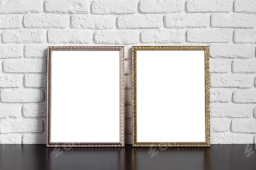 Preview: Blank picture frame against brick wall with copy space