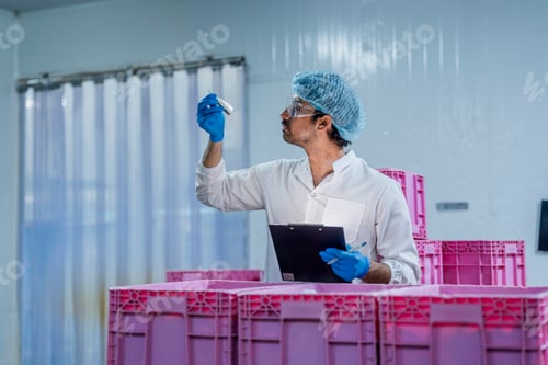 Preview: scientist inspecting seafood product processing in a clean factory.