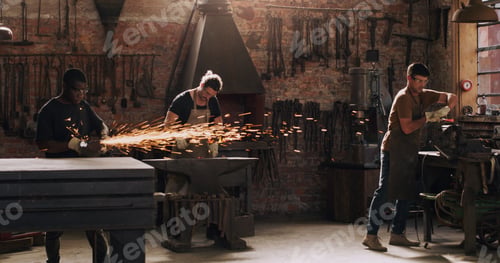 Preview: If you can dream it, we can do it. Shot of three metal workers working in a welding workshop.