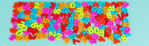 Preview: Top view of colorful numbers on blue background, panoramic shot