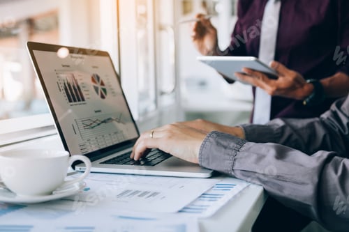 Preview: entrepreneur person working and colleague analyzing data for new start-up