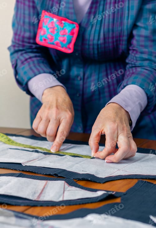 Preview: Dressmaker design tailor pattern on the table