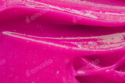 Preview: Pink gel texture. Cosmetic clear liquid cream smudge. Skin care product sample closeup. Toothpaste