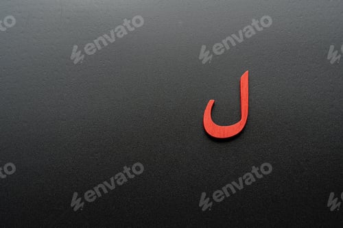 Preview: Image of Arabic letters made of wood on a black background