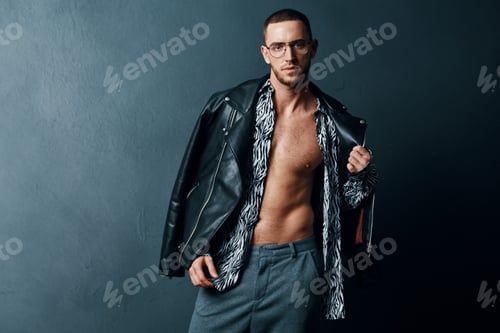 Preview: fashionable man in black leather jacket posing self confidence