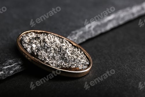 Vista previa: Stylish brooch on black background, space for text. Luxury jewelry