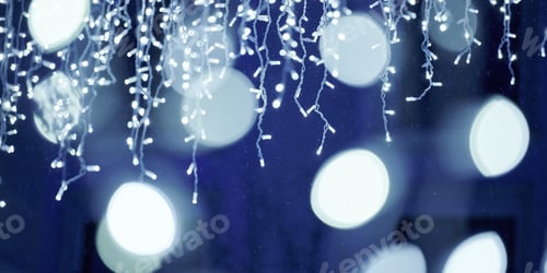 Preview: Blue lights bokeh from christmas holiday garlands, blurred festive background, abstract lights