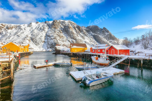 Preview: Amazing morning seascape of Norwegian sea and cityscape of Nusfjord village.