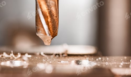 Preview: Drill close-up at the workplace in workshop