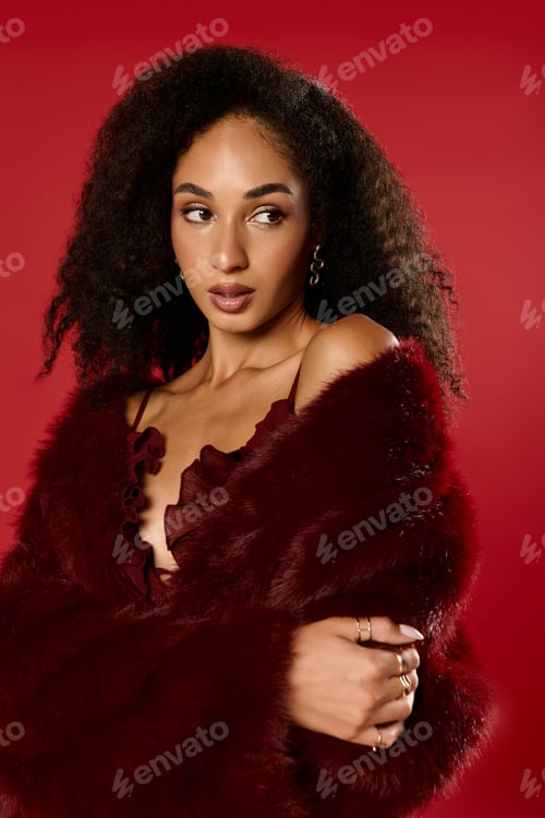 Preview: Elegant african american woman showcases stylish autumn fashion in trendy studio setting