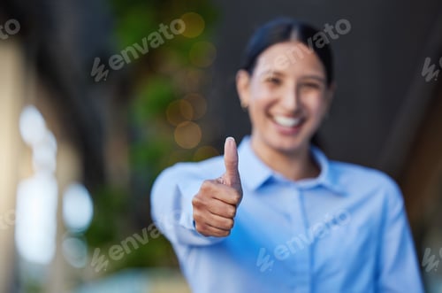 Preview: Close up of a cheerful mixed race smiling businesswoman making thumbs up gesture outside. Young his
