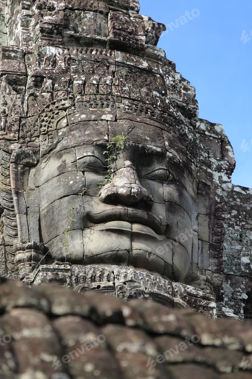 Preview: Antique statue standing majestically in the Angkor Wat temple complex in Cambodia