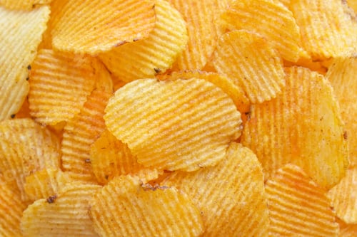 Preview: Potato chips or crisps texture background.