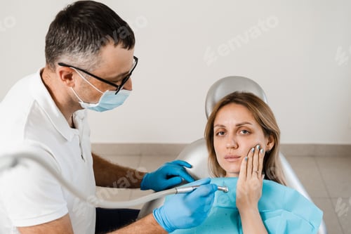 Preview: Patient receives dental care for toothache and caries in stomatology clinic