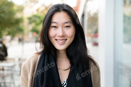 Preview: Beautiful happy young woman smiling confident and standing at the city - Portrait of young asian
