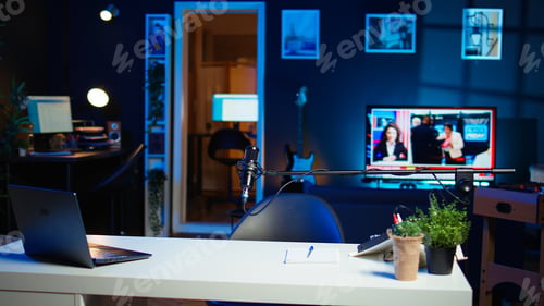 Preview: Panning shot of empty home studio with content creation gear tech