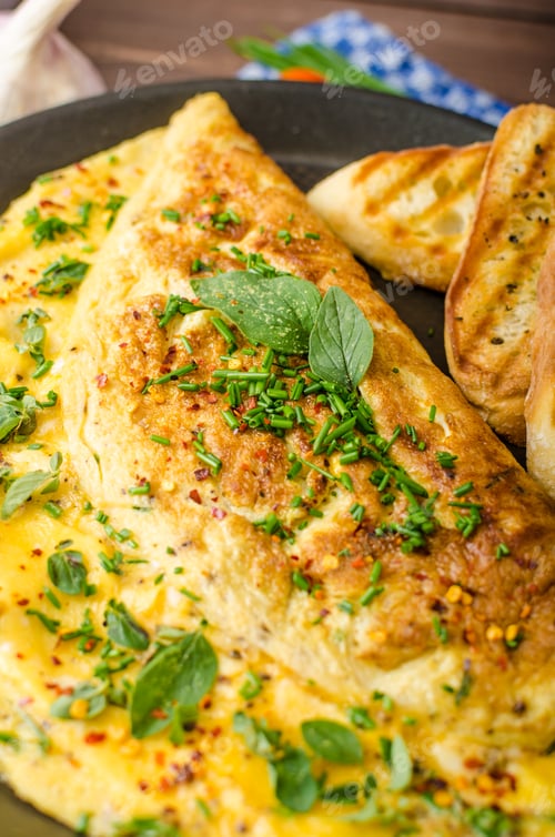 Preview: Herb omelette with chives and oregano sprinkled with Herb omelette with chili flakes
