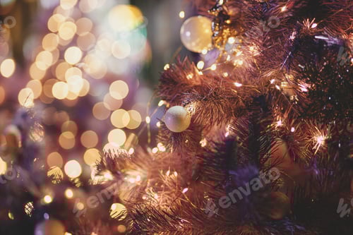 Preview: Stylish modern purple christmas tree on background of golden lights illumination bokeh. Magic time