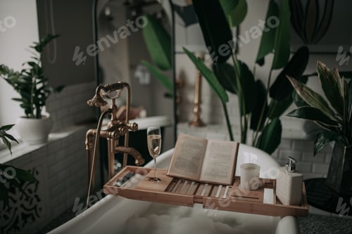 Preview: Luxurious interior bathroom in modern eco style with oval bathtub and book on bamboo wood tray