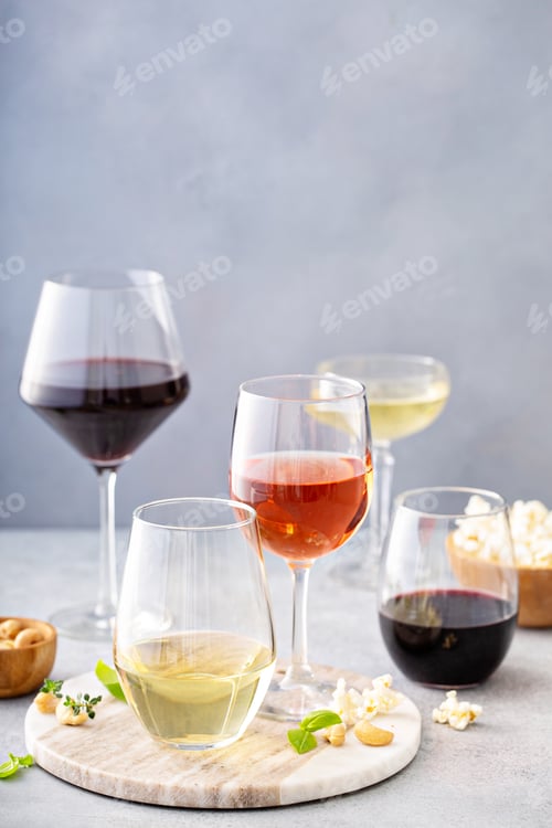 Preview: Red, white wine and rose in different glasses