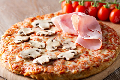 Preview: Fresh delicious pizza baked pizza with tomato, mozzarella cheese, ham and mushrooms.