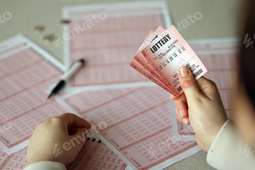 Preview: Filling out a lottery ticket. A young woman holds the lottery ticket