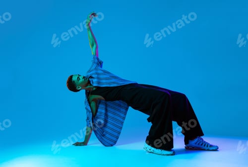 Preview: African man portrait in studio on colorful background