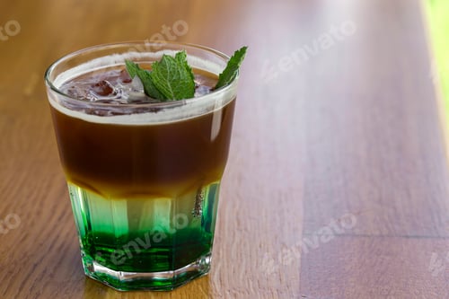Preview: Cold coffee with mint leaves and ice cubes
