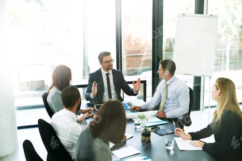Preview: Shot of a team of executives having a formal meeting in a boardroom