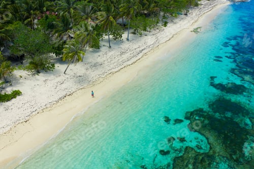 Preview: Tourist on a tropical beach in the Philippines