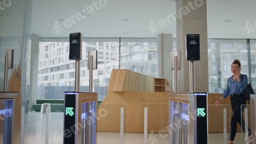 Preview: Lady passing electronic door office using smartwatch. Woman entering turnstile