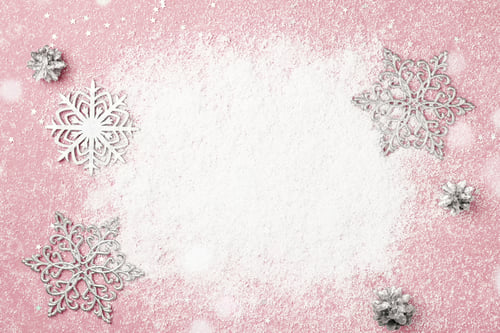 Preview: Pink Christmas Background with Snowflakes and Snow as Copy Space.