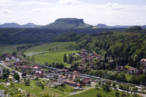 Preview: View from the Bastei to the river Elbe and the city Rathen on the horizon Mount Lilienstein