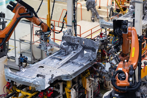 Preview: Photo of automobile production line. Welding car body. Modern car assembly plant. Auto industry