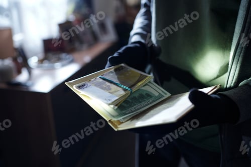 Preview: Unrecognizable Man Wearing Gloves Counting Euro Banknotes Indoors