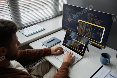 Preview: Man Coding at Office Workplace Working in It Development