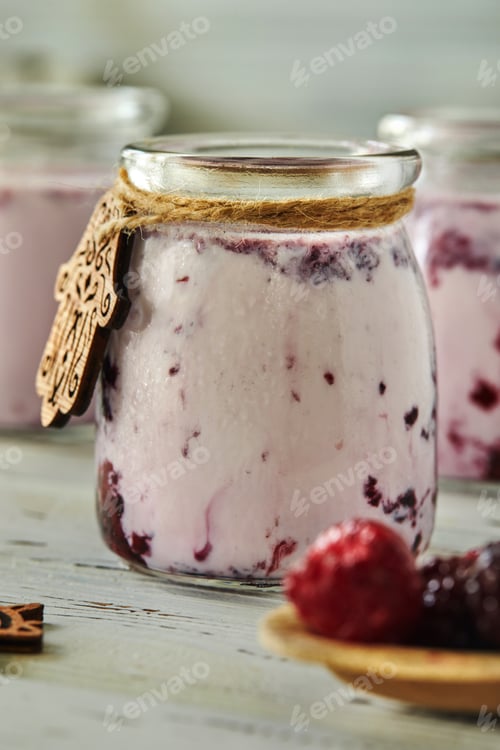 Preview: Smoothies with mulberry, raspberries and currants on a light background