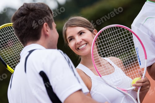 Preview: Tennis Couple At The Court Looking Happy And Smiling