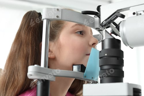 Preview: Little girl visiting ophthalmologist in clinic