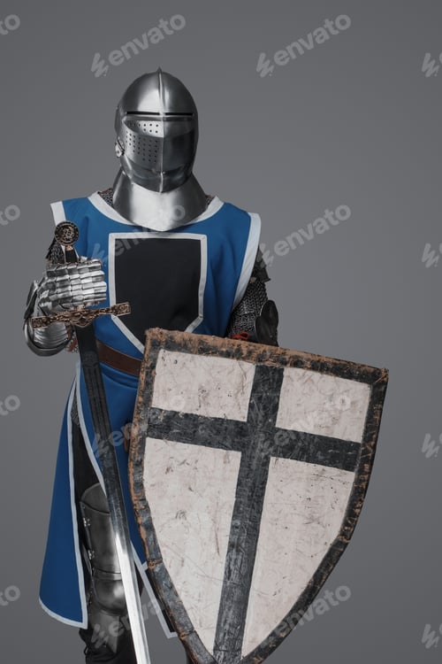 Preview: Medieval knight in blue surcoat holding a sword and shield