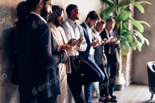 Preview: large group of business people all busy on mobile phone
