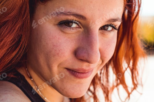 Preview: Happy redhead girl in a park, Close up shot