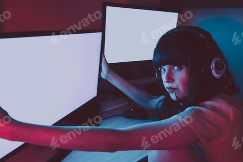 Preview: Young streamer woman working at night from home